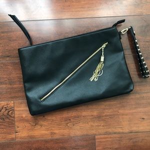 Xlarge clutch with gold details.